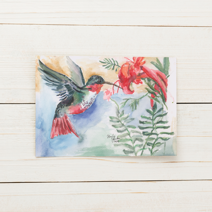 Flat cardstock note card featuring original watercolor piece A Garden Visit displayed on a white painted wooden surface.