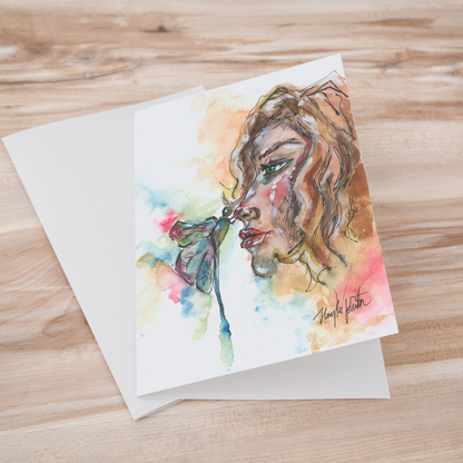 Folding cardstock greeting card featuring original watercolor piece Dragonfly Girl laying one on top of another.