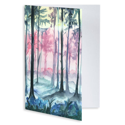 Folding cardstock greeting card featuring original watercolor piece Fairy Forest slightly open to display the empty inside.