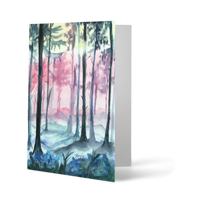 Folding cardstock greeting card featuring original watercolor piece Fairy Forest standing upright.