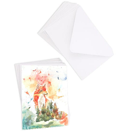 A stack of flat cardstock note cards featuring original watercolor piece Forest Fox next to a stack of the matching euro flap envelopes.