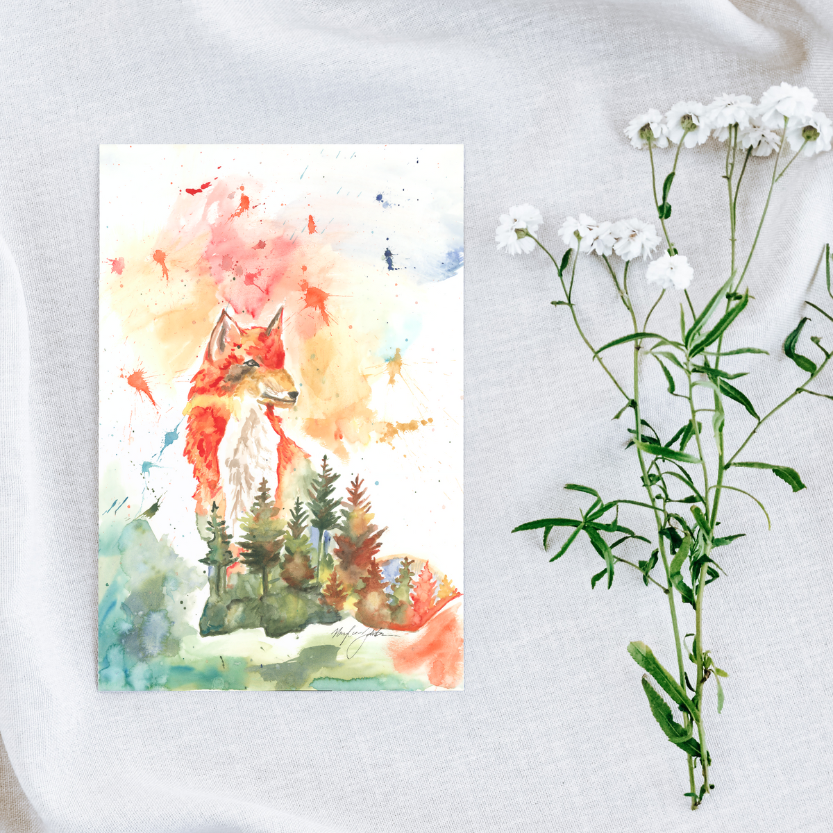 Flat cardstock note card featuring original watercolor piece Forest Fox on a white linen background next to fresh white flowers.