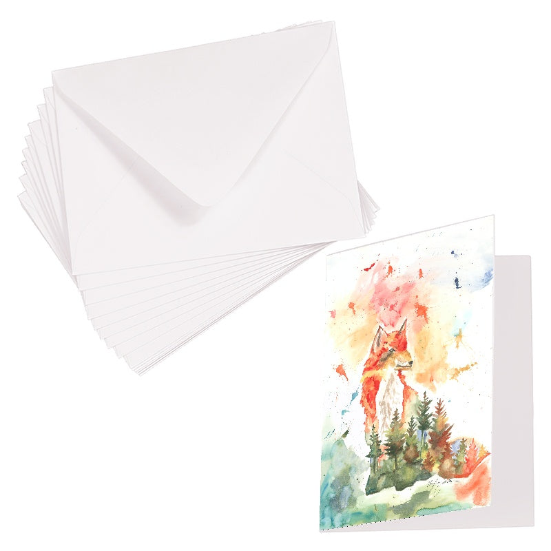 Folding cardstock greeting card featuring original watercolor piece Forest Fox laying next to a stack of euro flap envelopes.