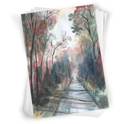 Flat cardstock note card featuring original watercolor piece Forest Road in a stack on a white background.