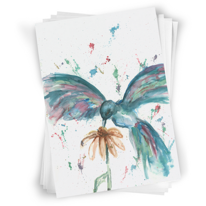 Flat cardstock note card featuring original watercolor piece Hovering Hummingbird in a stack on a white background.