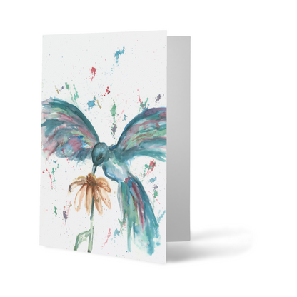 Folding cardstock greeting card featuring original watercolor piece Hovering Hummingbird standing upright.