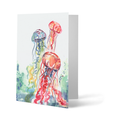 Folding cardstock greeting card featuring original watercolor piece Jellyfish Bloom standing upright.