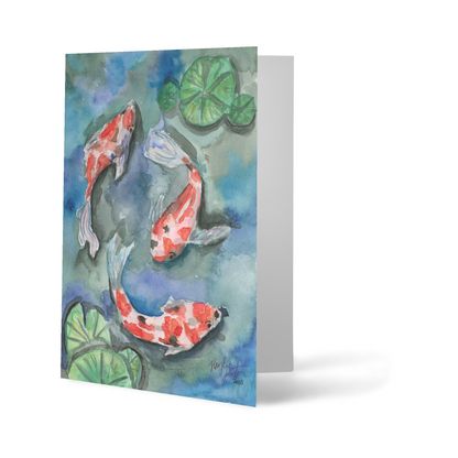 Folding cardstock greeting card featuring original watercolor piece Koi Pond standing upright.