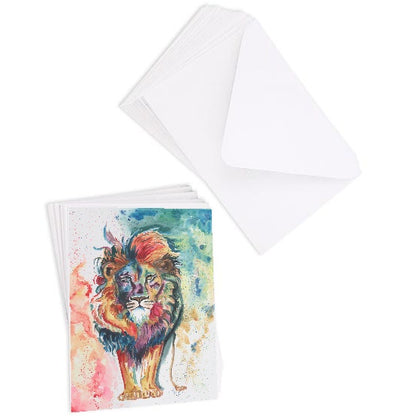 A stack of flat cardstock note cards featuring original watercolor piece Lion of Judah next to a stack of the matching euro flap envelopes.