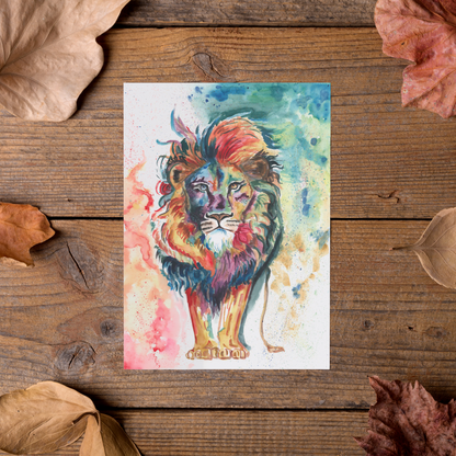 Flat cardstock note card featuring original watercolor piece Lion of Judah styled on rustic wooden boards with dried autumn leaves.