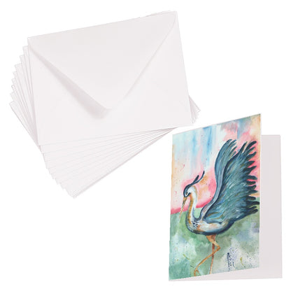 Folding cardstock greeting card featuring original watercolor piece Morning Glories laying next to a stack of euro flap envelopes.