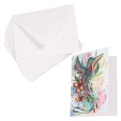 Folding cardstock greeting card featuring original watercolor piece Queen of Flight laying next to a stack of euro flap envelopes.
