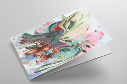Folding greeting card featuring original watercolor piece Queen of Flight laying down showing cardstock thickness and blank inside.