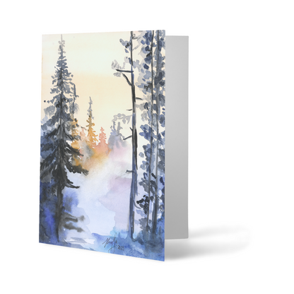 Folding cardstock greeting card featuring original watercolor piece Winter Wood standing upright.